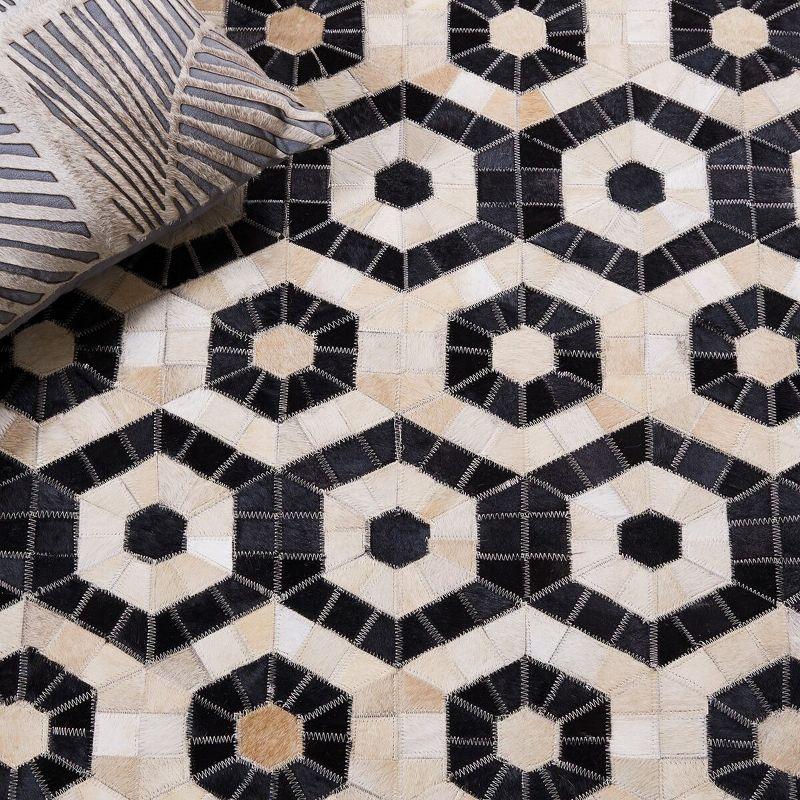 Black and Beige Geometric Handmade Cowhide Area Rug