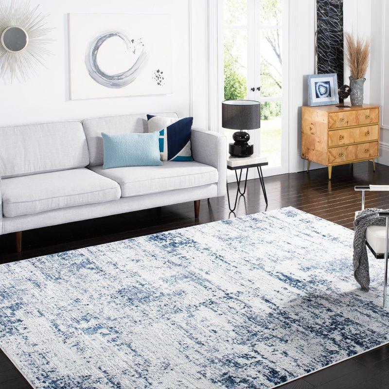 Ivory and Navy Abstract Reversible Square Synthetic Rug