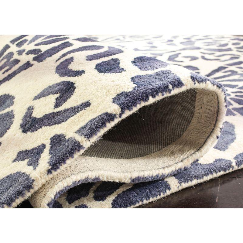 Dip Dye DDY719 Hand Tufted Area Rug - Ivory/Navy - 8'x10' - Safavieh.
