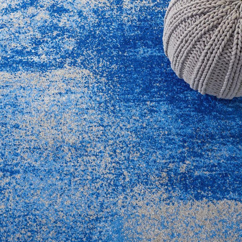 Reversible Silver and Blue Abstract Synthetic Area Rug