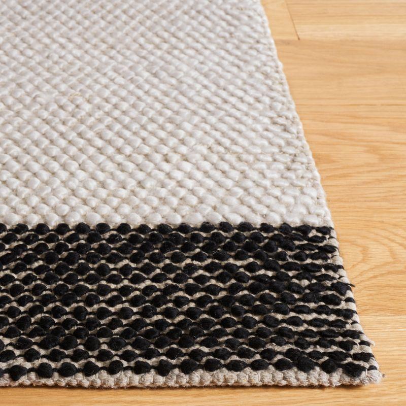 Ivory and Black Hand-Tufted Wool Area Rug - Artisan Crafted, 5' x 8'