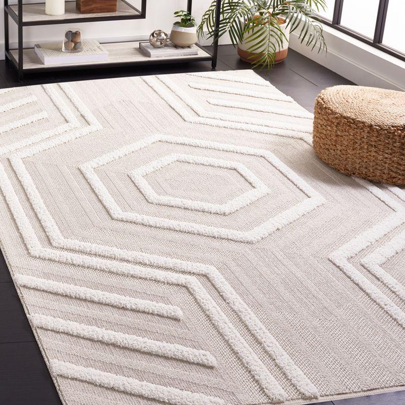 Ivory Geometric Flat Woven Synthetic Round Rug