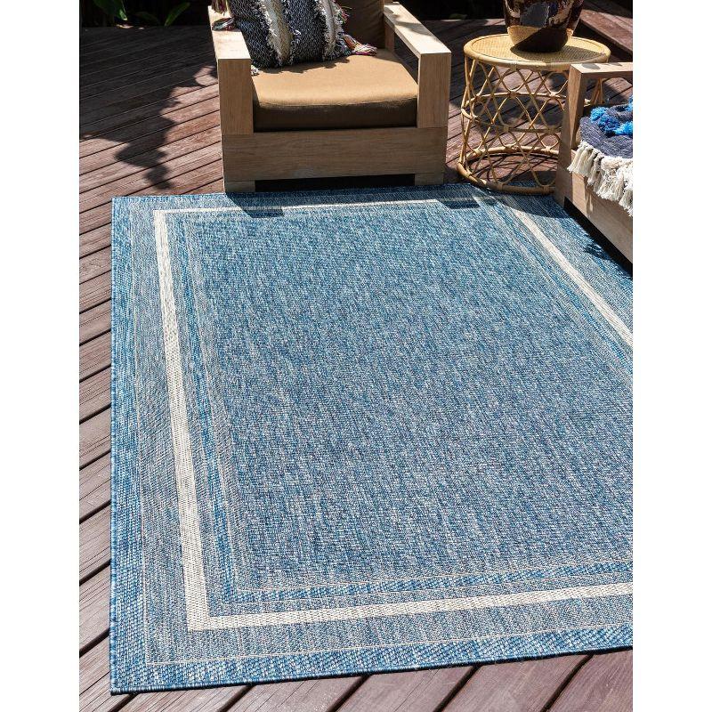 Serene Blue Flatweave 5'3" x 8' Outdoor Rug with Simple Border