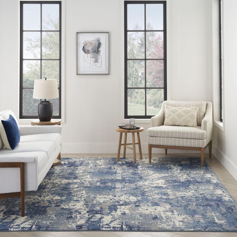 Abstract Navy Blue Synthetic 5'3" x 7'3" Easy-Care Area Rug