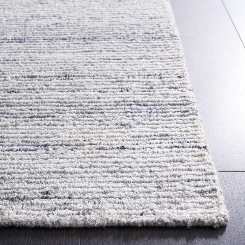 Mirage MIR425 Hand Tufted Indoor Rug - Safavieh