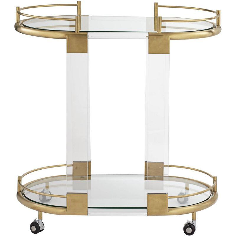 55 Downing Street Adaline 29 1/2" Wide Clear Acrylic and Gold Oval Bar Cart