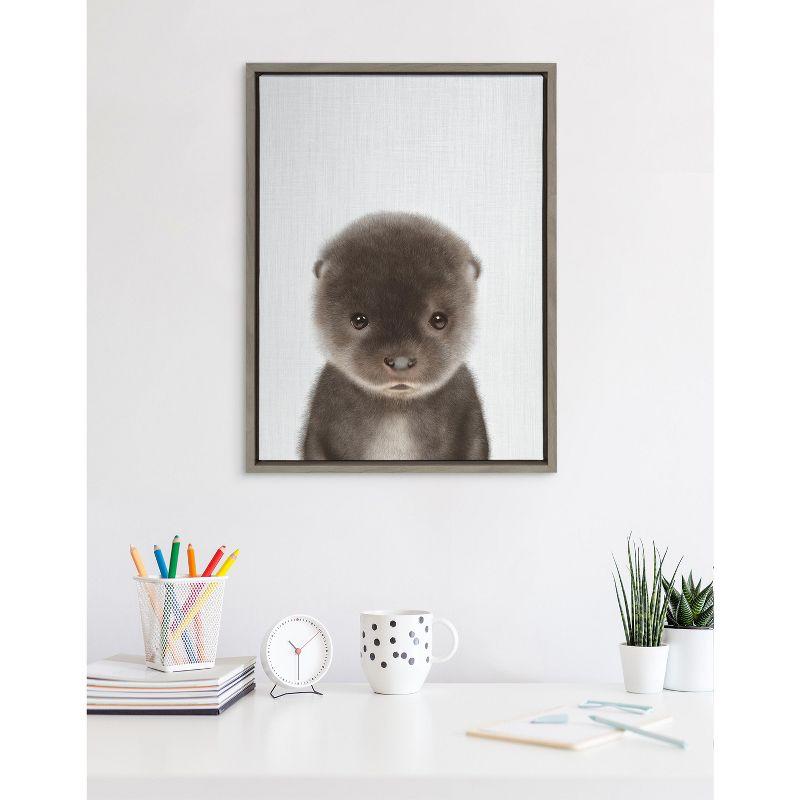 Kate and Laurel Sylvie Baby Otter Color Illustration Framed Canvas by Simon Te of Tai Prints, 18x24, Gray