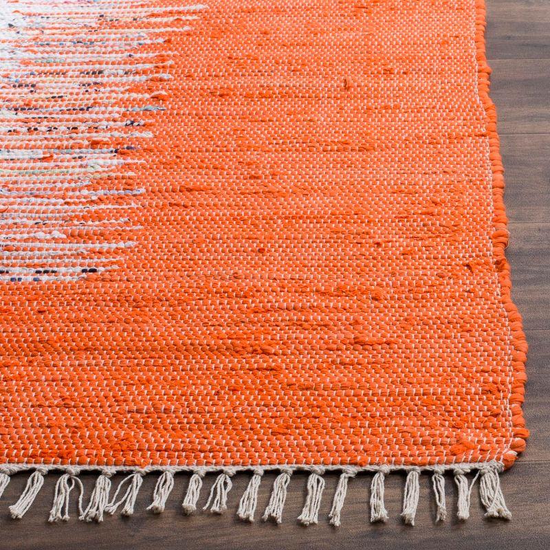 Ivory and Orange Cotton Flat Woven 6' x 9' Area Rug