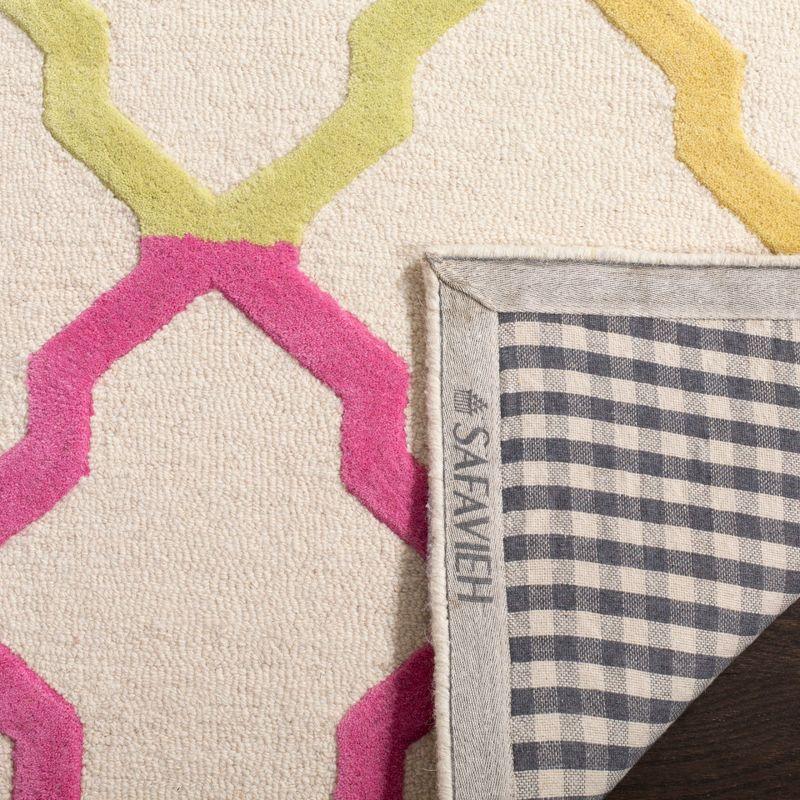 Safavieh Kids SFK102 Hand Tufted Indoor Area Rug - Ivory/Multi - 8'x10' - Safavieh