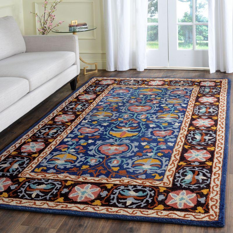 Handmade Blue Wool 4' x 6' Tufted Area Rug