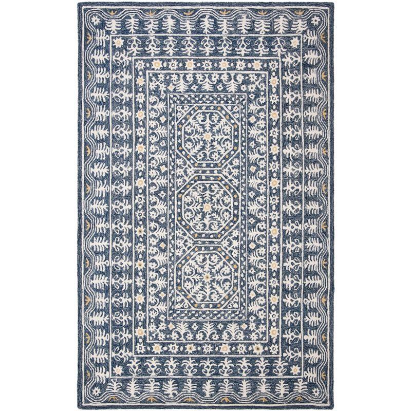 Handmade Blue and Ivory Tufted Wool Area Rug