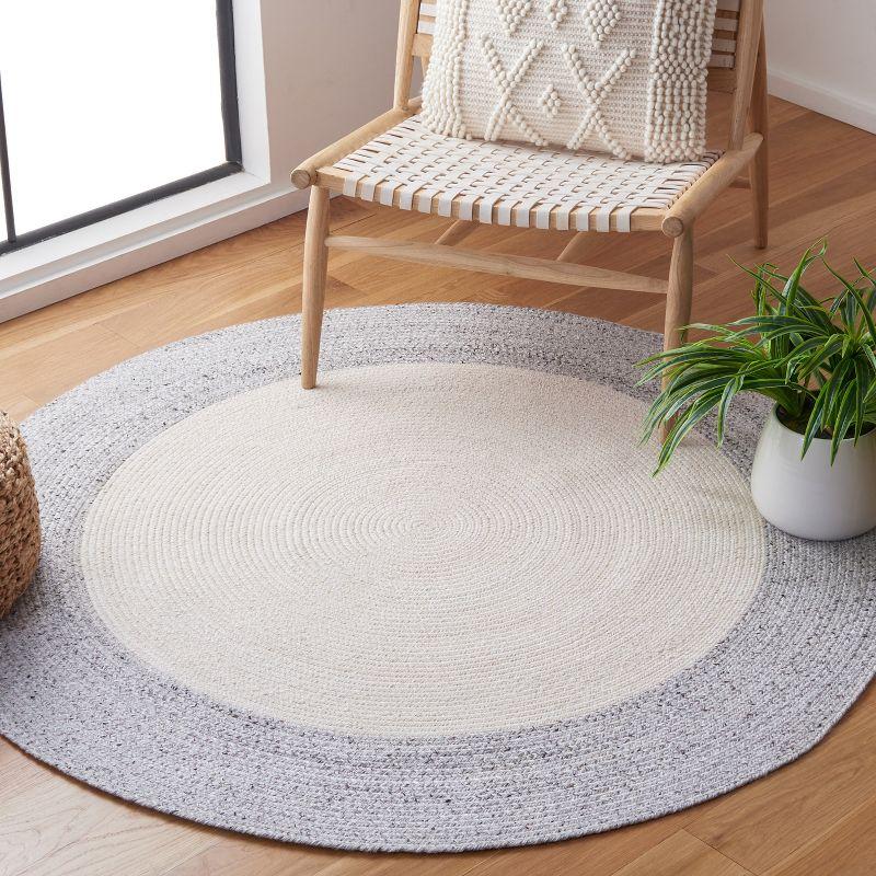 Ivory and Light Grey Round Braided Synthetic Rug, 47"