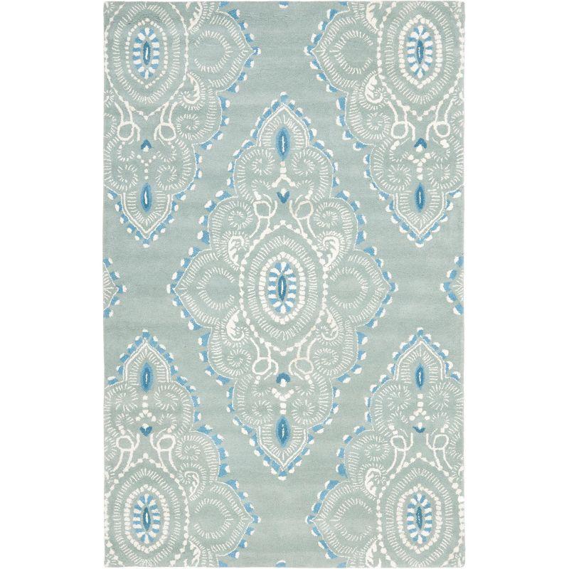 Hand-Tufted Blue and Ivory Wool Area Rug, 5' x 8'