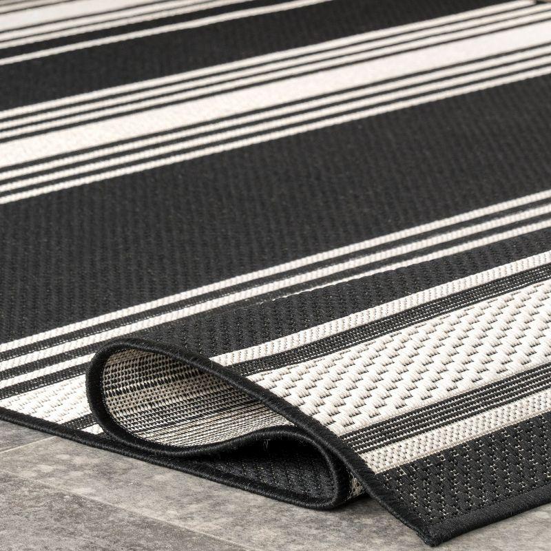 Black and White Striped Synthetic 5' x 8' Indoor/Outdoor Rug