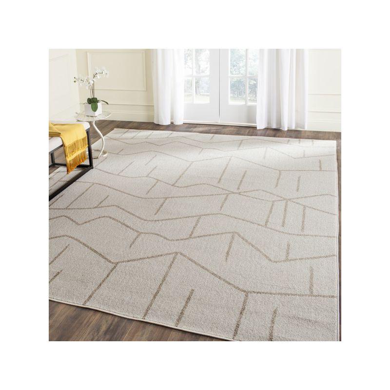 Ivory Geometric Easy-Care 8' x 10' Synthetic Area Rug