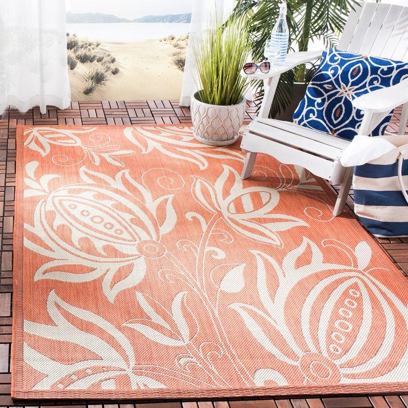 Rectangular Terracotta and Natural Floral Synthetic Area Rug