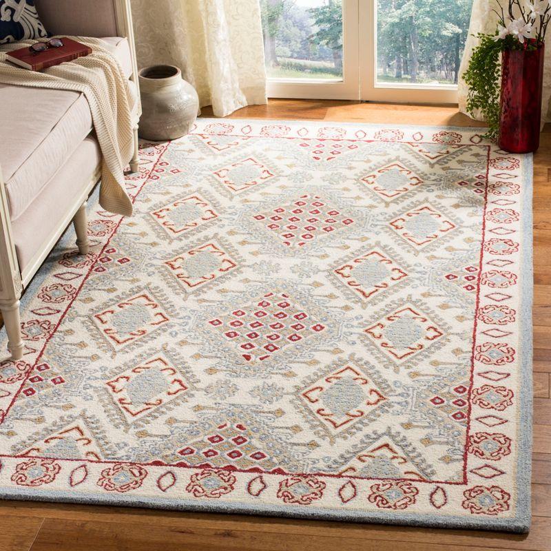 Micro-Loop MLP511 Hand Tufted Indoor Area Rug - Ivory/Red - 5'x8' - Safavieh