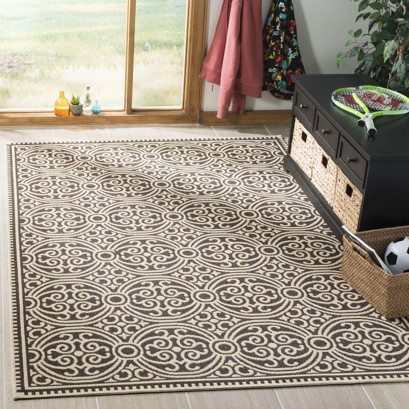 Cream and Brown Geometric Flat Woven 4' x 6' Area Rug