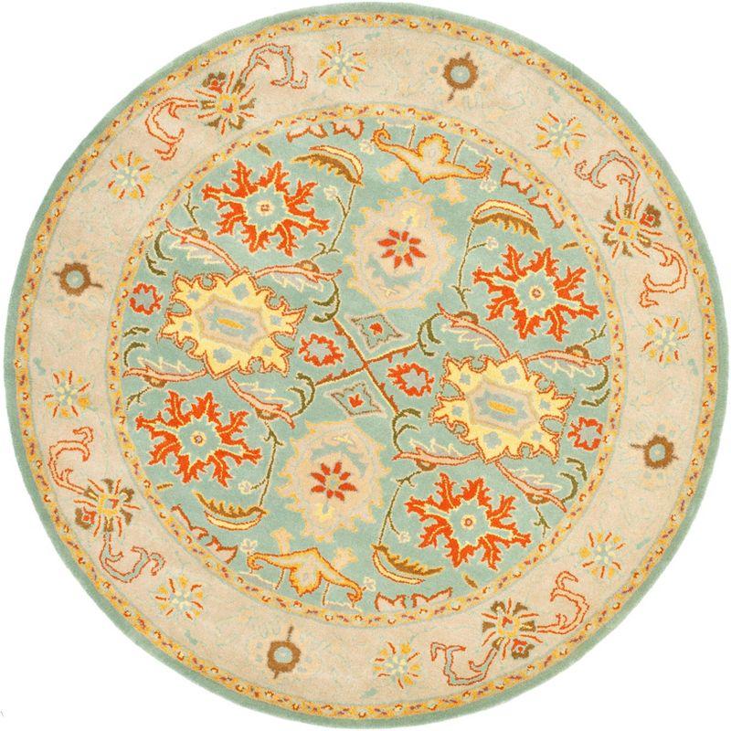 Elegant Heritage 8' Round Light Blue & Ivory Wool Area Rug