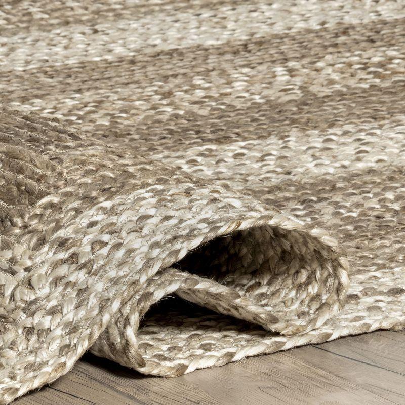 Handcrafted Charlene 8'x10' Natural Jute Braided Area Rug