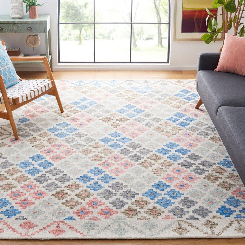 Ivory and Blue Hand-Tufted Wool Area Rug