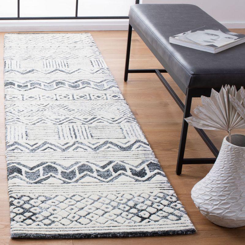 Roslyn ROS802 Hand Tufted Runner Rug - Black/Ivory - 2'3"x9' - Safavieh.