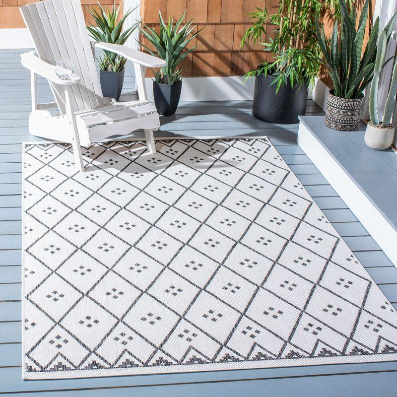 Ivory and Black Rectangular Indoor/Outdoor Area Rug