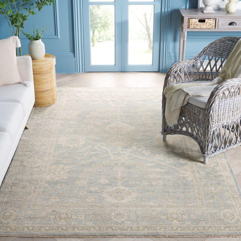 Light Blue and Ivory Hand-Knotted Wool Area Rug, 8' x 10'