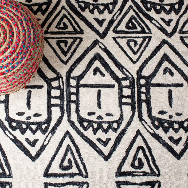 Metro MET404 Hand Tufted Area Rug - Black/Ivory - 8'x10' - Safavieh.