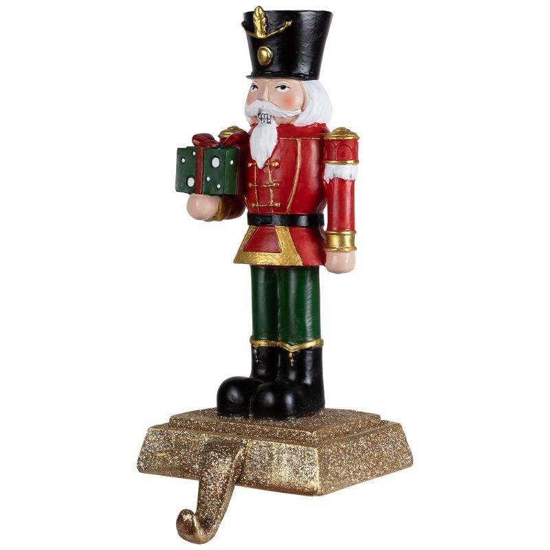 Northlight Glittered Nutcracker Soldier with Gift Christmas Stocking Holder - 9.5"