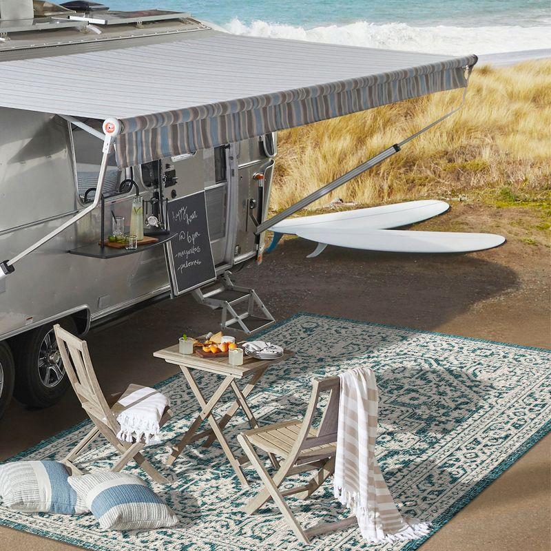 4'x6' Sinjuri Medallion Textured Weave Indoor/Outdoor Area Rug,  Teal Blue/Gray - JONATHAN Y