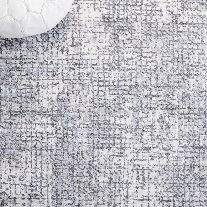 Ivory Abstract 4' x 6' Synthetic Easy Care Rug