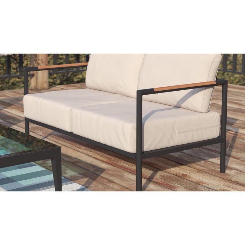 Emma and Oliver Black Aluminum Frame Loveseat with Teak Arm Accents and Beige Cushions