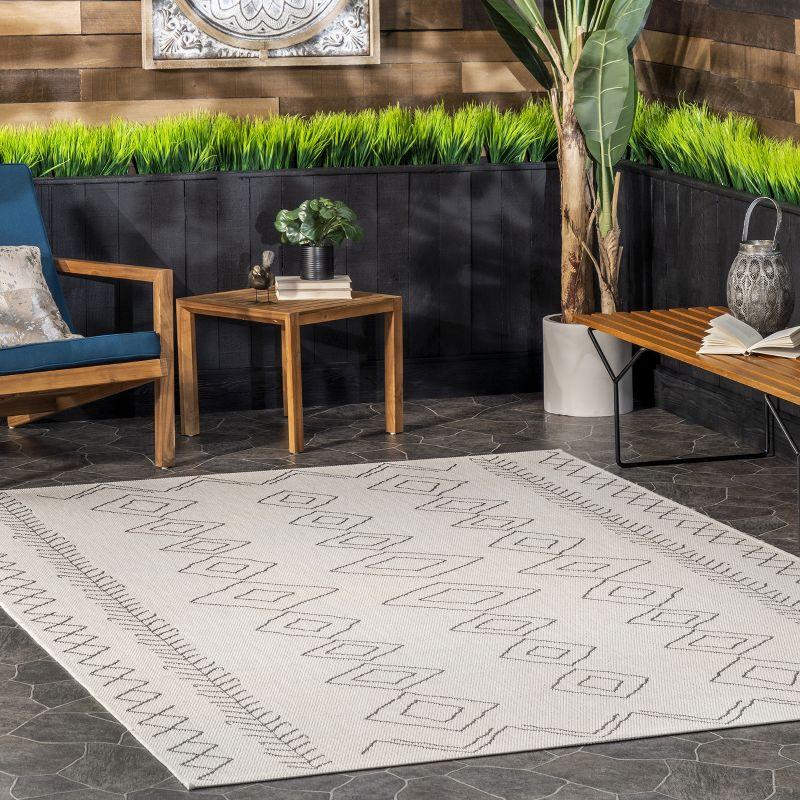 Ivory Geometric Easy-Care Outdoor 7.5' x 10.75' Area Rug