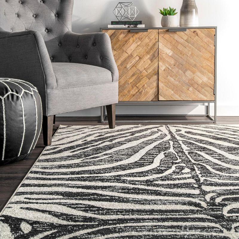 Reversible Black Zebra Stripes Synthetic Area Rug, 6'7" x 9'