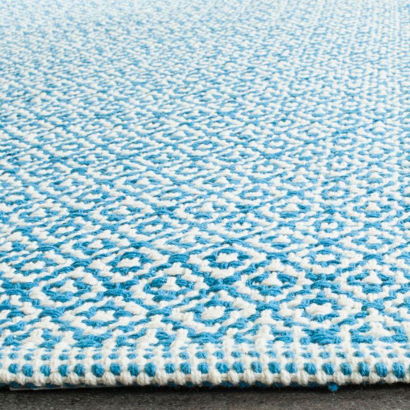 Montauk MTK717 Hand Woven Area Rug - Ivory/Blue - 5'x7' - Safavieh.