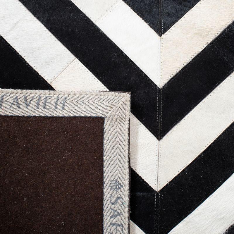 Hand-Knotted Geometric Black and White Cowhide Area Rug 5' x 8'