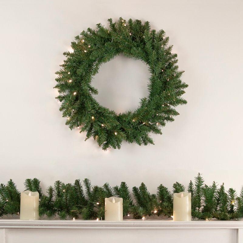 24-Inch Pre-Lit Artificial Pine Christmas Wreath with Cool White LED Lights