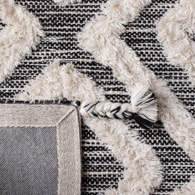 Kenya KNY331 Hand Tufted Area Rug - Black/Ivory - 5'x8' - Safavieh.
