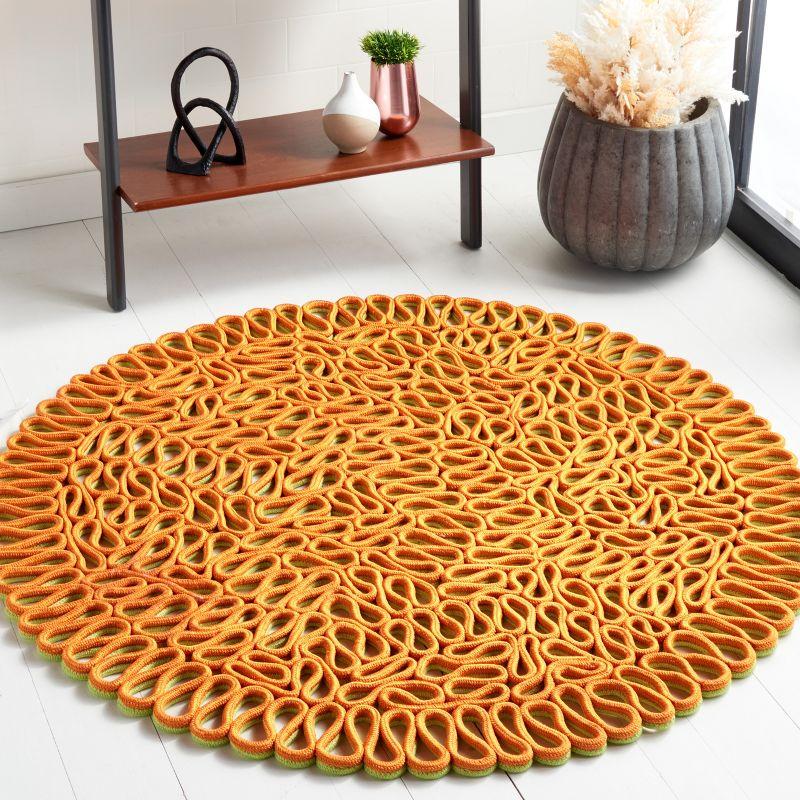 Novelty NOV701 Hand Knotted Area Rug - Orange/Green - 6' Round - Safavieh.