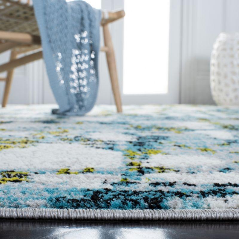 Trent Austin Design® Hollman Abstract Teal/Green/White Area Rug