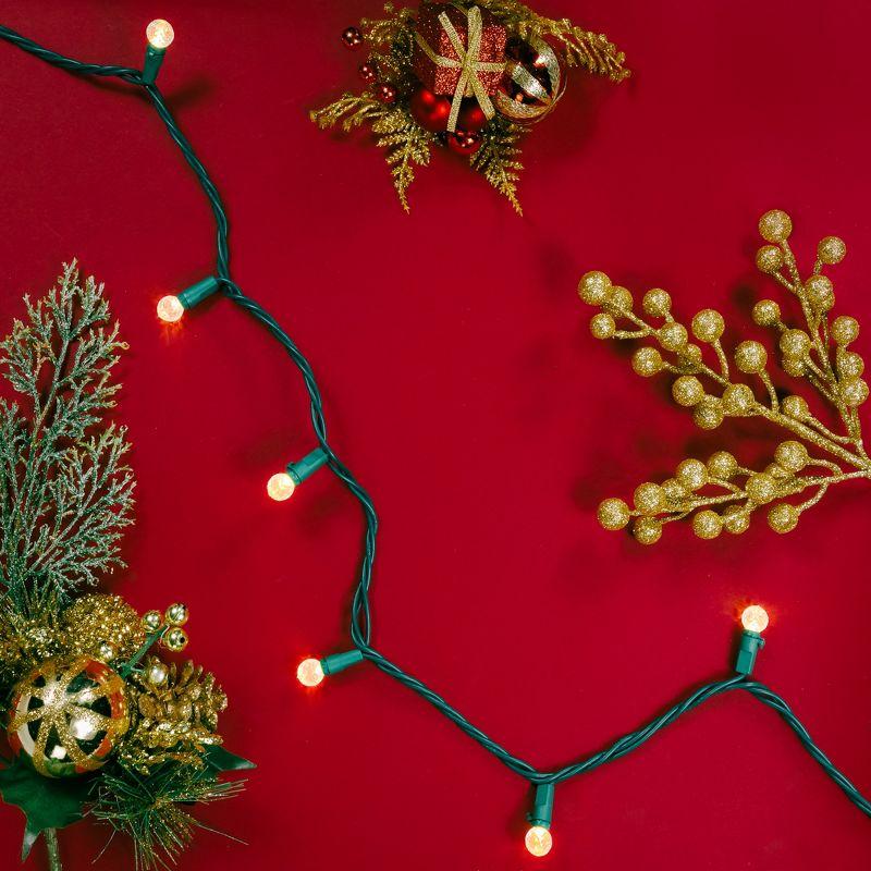 Northlight LED G12 Berry Christmas Lights - Warm White - 16' Green Wire - 50 ct