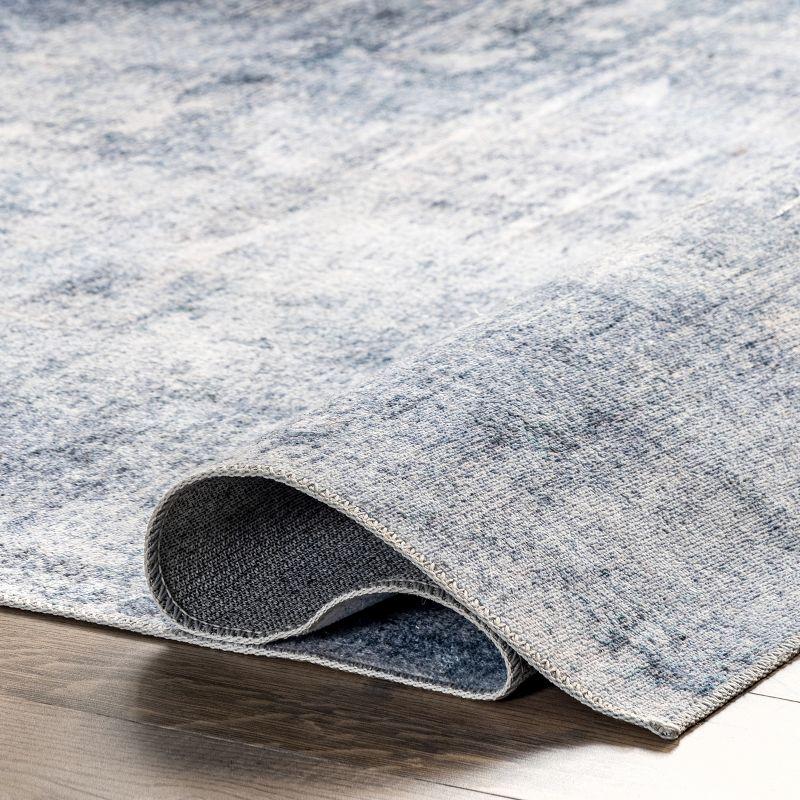 Sustainably-Sourced Blue Abstract 5' x 8' Washable Area Rug