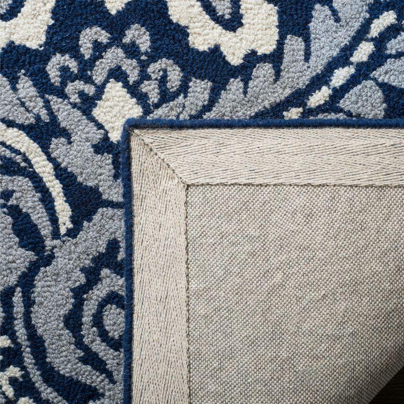 Ivory and Navy Tufted Wool Rectangular Area Rug