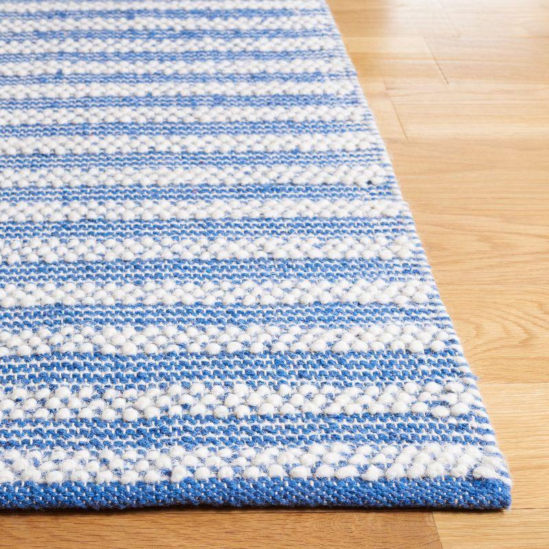 Ivory and Blue Flat Woven Wool Area Rug