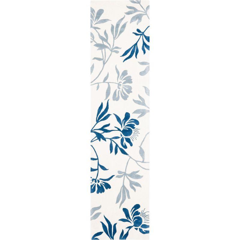 Capri CPR345 Hand Tufted Runner Rug - Ivory/Blue - 2'3"x9' - Safavieh.