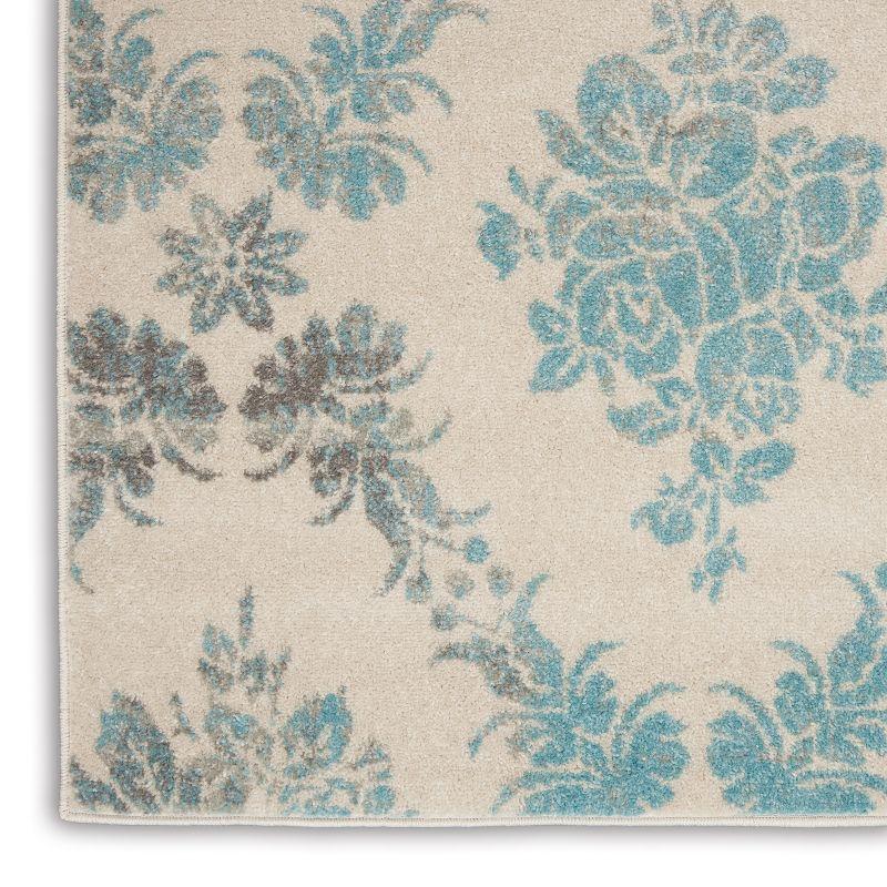 Elegant Ivory and Turquoise Floral Synthetic 6' x 9' Area Rug