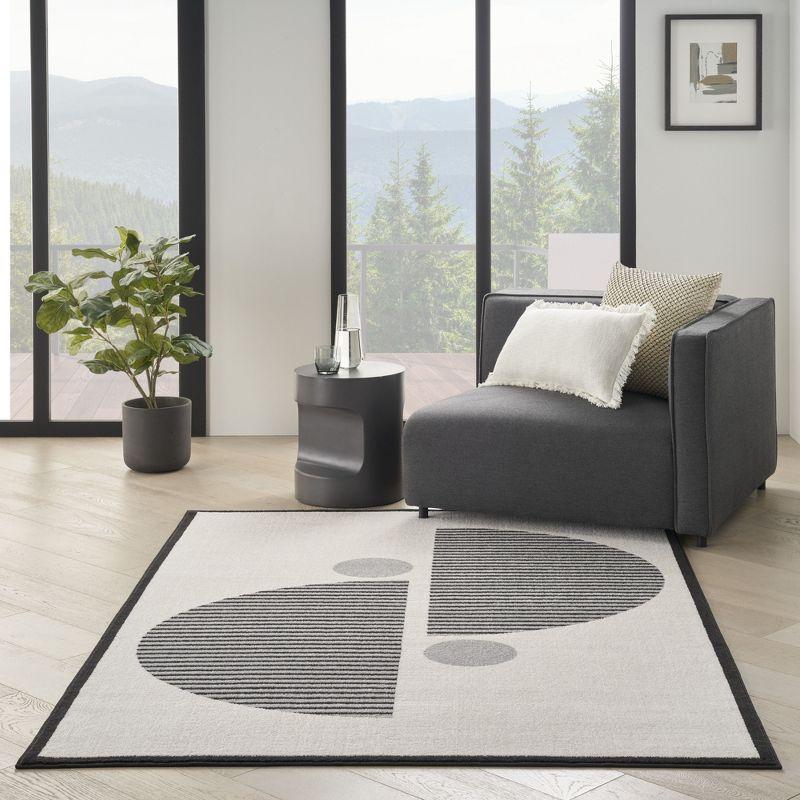 Nourison Modern Passion Circle Mid-Century Modern Indoor Rug Ivory/Black 6' x 9'