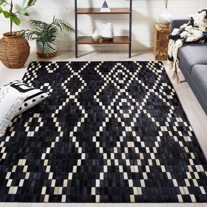 Hand-Stitched Geometric Black Cowhide 4' x 6' Area Rug