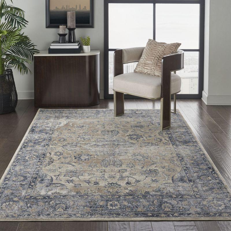 Ivory and Blue Rectangular Synthetic Area Rug 5' x 7'